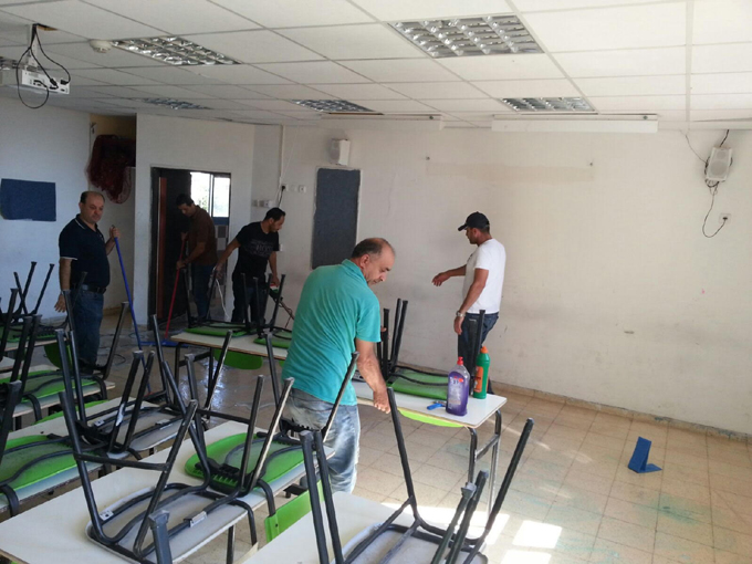 يوم عمل تطوعي في مدرسة الرازي